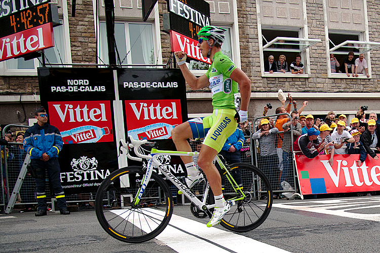 Stage winner, Slovakia's Peter Sagan celebrates on the finish line at the end of the 197 km and third stage of the 2012 Tour de France cycling race starting in Orchies and finishing in Boulogne-sur-Mer, northern France, on July 3, 2012.  The 99th Tour de France, to be held from June 30 till July 22, is made up of one prologue and 20 stages and will cover a total distance of 3.497 kilometres.   AFP PHOTO / NATHALIE MAGNIEZ        (Photo credit should read NATHALIE MAGNIEZ/AFP/GettyImages)